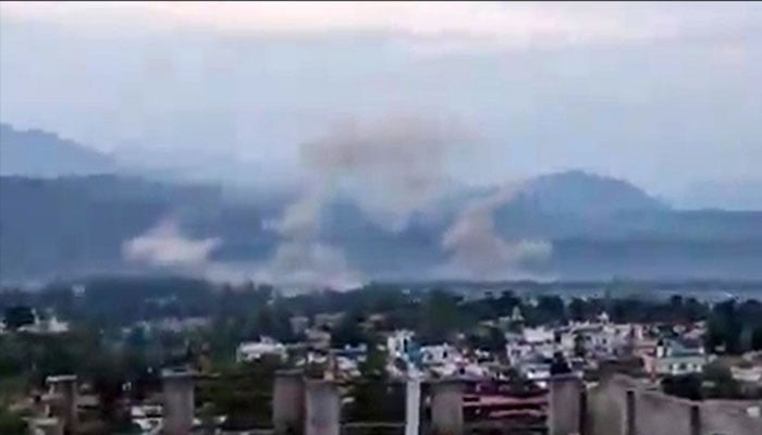 Screengrab from video issued by Pakistan army showing smoke rising from Udhampur Air Base struck by Pakistani missile site, May 10, 2025. — ISPR