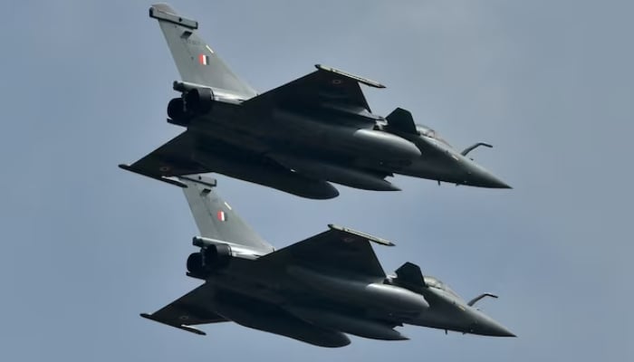 Indian Air Forces Rafale fighter jets fly past during the Aero India 2021 air show at Yelahanka air base in Bengaluru, India, on February 3, 2021. —Reuters