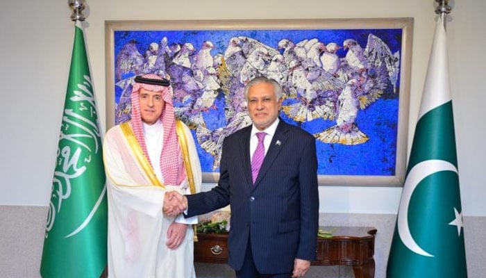 Saudi Minister of State for Foreign Affairs, Adel Al-Jubeir (left) shakes hand with Deputy Prime Minister/Foreign Minister Mohammad Ishaq Dar at Ministry of Foreign Affair — APP