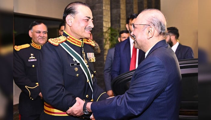 Chief of Army Staff (COAS) Field Marshal Asim Munir (left) welcomes President Asif Ali Zardari at a dinner hosted by the army chief to honour the political leadership. — ISPR